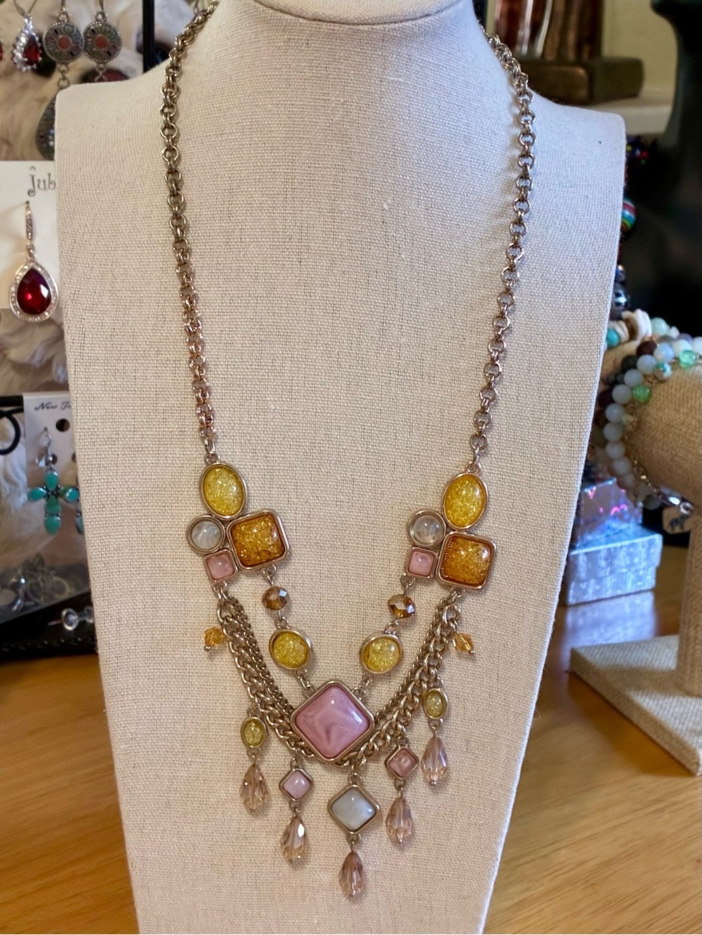 Vintage-style geometric multi-strand statement necklace.